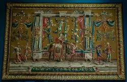 Гобелен мануфактуры Бове (1700-1720, дизайн Жан-Батиста Моннойера) — производство гобеленов в Бове было коммерчески успешно, но они не были такими престижными как продукция Королевской мастерской